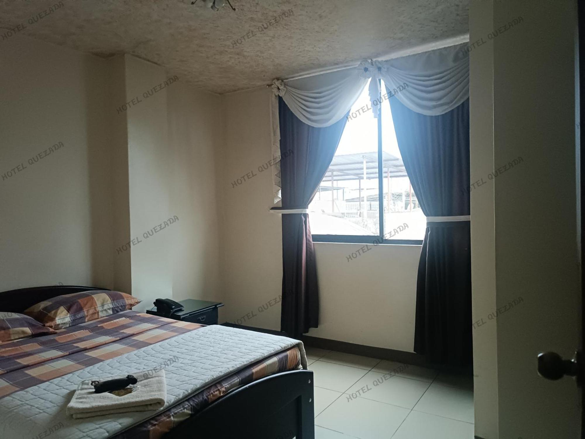 Hotel Quezada Hermanos Santo Domingo de los Colorados Dış mekan fotoğraf